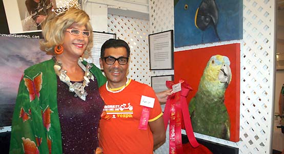 Queen Beach DeBree gives Queens Choice ribbon to Andrew Loren Restos parrot painting - photo by Bruce-Michael Gelbert
