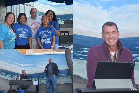 Cherry Grove Pizza staff (left to right) Jamie, Kamala, proprietor Frank Pezzuto, Christina & Amy (missing from photo: AJ), Dan Daly against Dennis McConkey's ocean mural, Dan Daly & Mike Schaefer - all photos by Bruce-Michael Gelbert