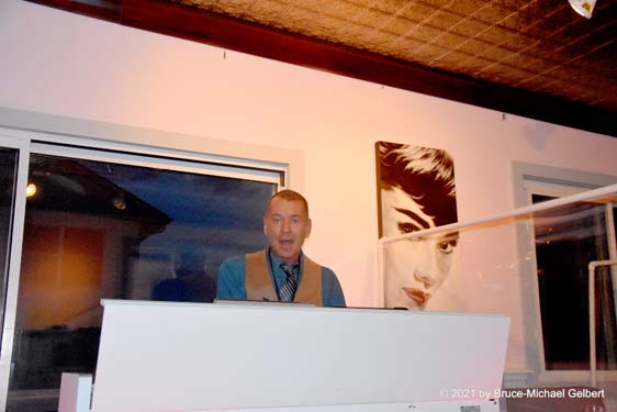 Dan Daly at Sand Castle, with Audrey Hepburn looking over his shoulder - photo by Bruce-Michael Gelbert