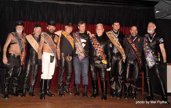 9 Messrs Fire Island Leather, in 2019 (left to right) 2001 Bruce-Michael Gelbert, 2005 Joseph Saporito, 2007 Diego Vargas, 2012 Mark Nayden, 2013 Candido Soares, 2015 Edd Clark, 2017 Sir Joseph, 2018 CB Kirby & 2019 Bruce Michael II - photo by Mel Flythe