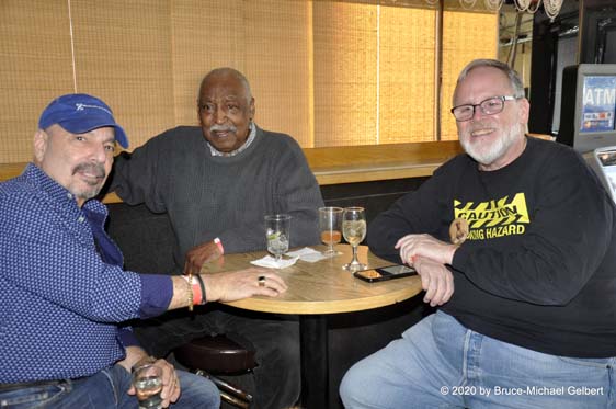 Charles Jacob Young (center), with Tony Negron & James Hughes at the Arts Project of Cherry Grove In-Town Party at the Monster on March 8, 2020 - photo by Bruce-Michael Gelbert